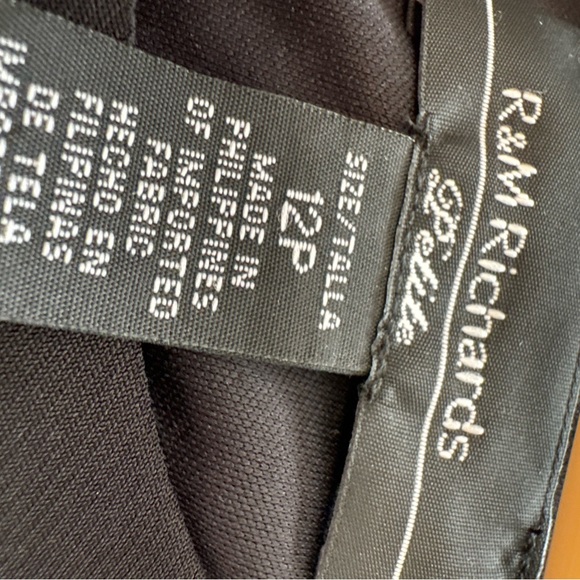 High/low black top with black and pink patterned skirt attached. - Picture 4 of 9